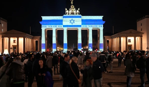 The Brandenburg Gate is illuminated in solidarity with Israel, marking the first anniversary of the Hamas spearheaded attacks on Israel, in Berlin, Germany, Monday, Oct. 7, 2024. (AP)