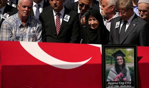 Mehmet, left. the father of Aysenur Ezgi Eygi, a 26 year-old Turkish-American activist killed by the Israeli military, attends prayers during his daughter's funeral outside the central mosque of Didim, Turkey, Saturday, Sept. 14, 2024,(AP)