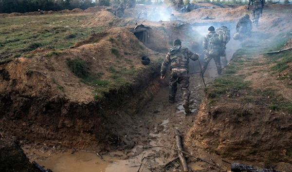 Ukrainian infantrymen train with French soldiers to learn combat skills, in France, Tuesday, Nov. 7, 2023. (AP)