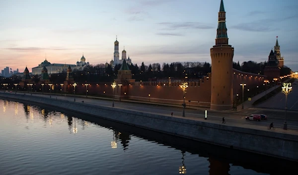 FILE - The Kremlin and embankment of the Moscow River are seen during sunset in Moscow, Russia, on Saturday, March, 28, 2020. (AP Photo, File)