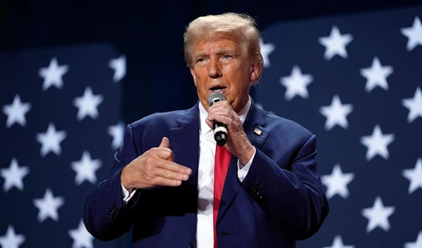 Republican presidential nominee former President Donald Trump speaks at a campaign town hall Friday, Oct. 4, 2024, in Fayetteville, N.C. (AP)