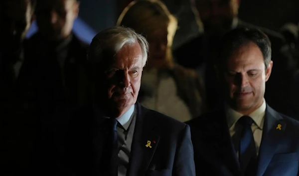 French Prime Minister Michel Barnier, left, at the Palais des Sports in Paris, on Monday, October 7, 2024 (AP)