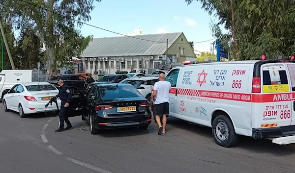 Red Star of David and Israeli police come to the scene of the stabbing operation in north Tel Aviv on October 9, 2024. (Social media)