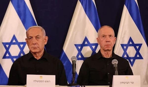 Israeli Prime Minister Benjamin Netanyahu (L) and Defense Minister Yoav Gallant attend a press conference in Tel Aviv on Oct. 28, 2023. (AFP via Getty Images)