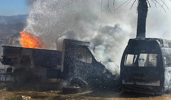 A truck and ambulance burn after Israeli airstrikes hit a group of paramedics outside a hospital in Marjayoun, south Lebanon, Friday, Oct. 4, 2024. (AP)