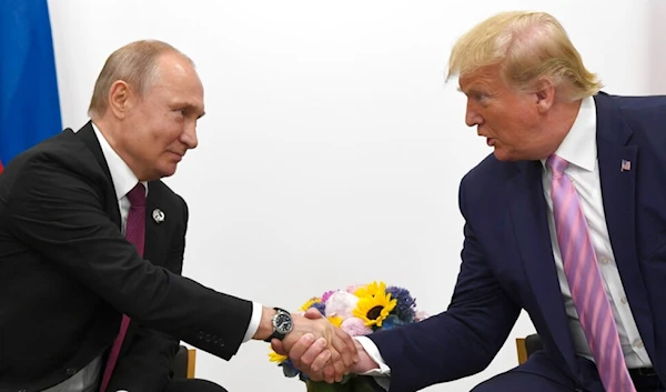 President Donald Trump, right, shakes hands with Russian President Vladimir Putin during a bilateral meeting on the sidelines of the G-20 summit in Osaka, Japan, Friday, June 28, 2019. (AP)