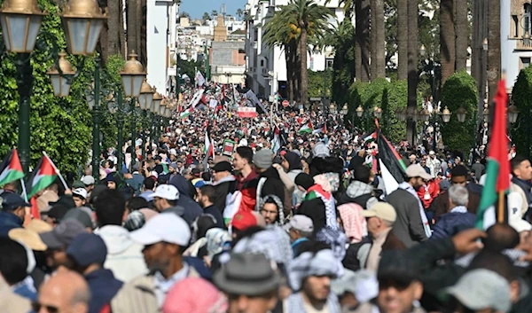 Thousands of Moroccans take part in a protest in support of Palestinians in Gaza and against the normalization of relations between Morocco and 'Israel', in Rabat, Morocco, February 11, 2024. (AP)