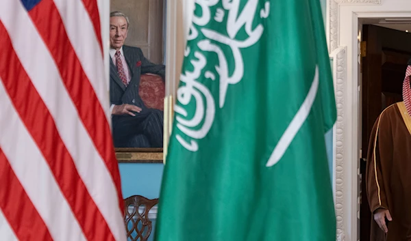 The flags of Saudia Arabia and the US are picture on Wednesday, Nov. 1, 2023, at the State Department in Washington. (AP Photo/Jacquelyn Martin)