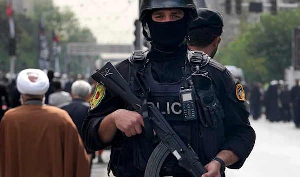 An Iranian police officer stands guard in Tehran, Iran, Thursday, August 1,2024. (AP)