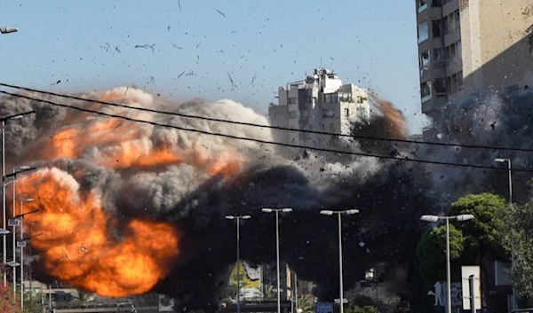 A photo showing an Israeli airstrike as impact is made on a residential building in Beirut's Southern Suburb, undated (Social Media)