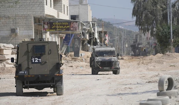 Israeli occupation forces during an invasion into Nur Shams camp, in the occupied West Bank city of Tulkarem, Oct. 31, 2024. (AP)