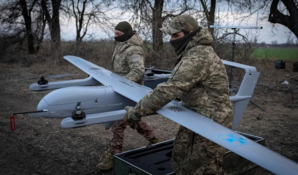 Ukrainian soldiers of the 22nd Mechanised brigade prepare to start the Poseidon H10 Middle-range UAV at the front-line, near Bakhmut, Donetsk region, Ukraine, Tuesday, March 26, 2024. (AP)