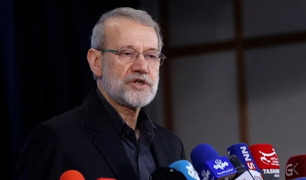 Ali Larijani speaks with media at the Interior Ministry in Tehran, Iran, Friday, May 31, 2024. (AP)