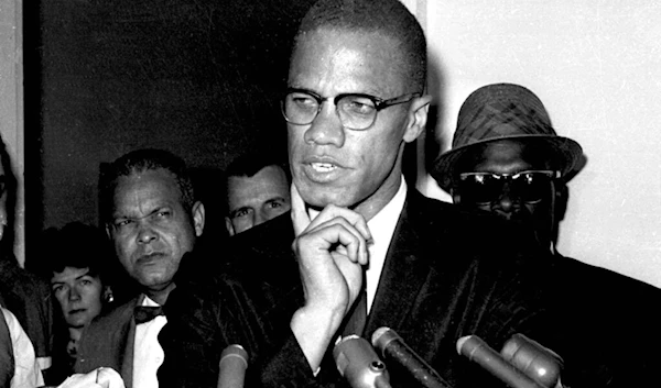 Malcolm X speaks to reporters in Washington, D.C., May 16, 1963. (AP)