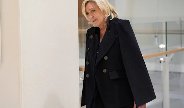 FILE - French far-right leader Marine Le Pen arrives at the courtroom for the trial over the suspected embezzlement of European Parliament funds, Wednesday, Nov. 6, 2024 in Paris. (AP)