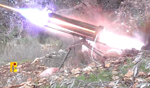 A Hezbollah fighter launches rockets toward the Yifath Barracks in northern occupied Palestine on November 15, 2024 (Islamic Resistance Military Media)