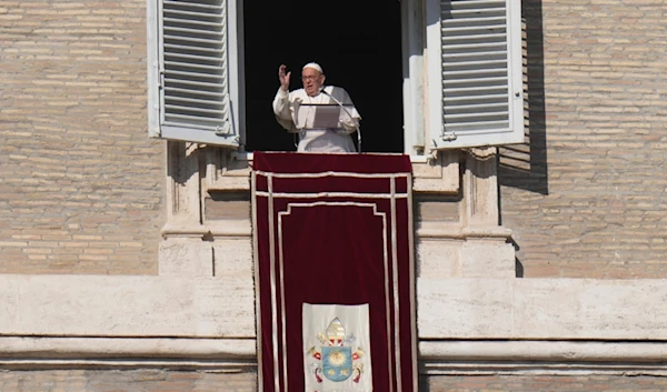 Pope Francis delivers his blessing during the Angelus noon prayer from the window of his studio overlooking St.Peter's Square, at the Vatican, Sunday, November 17, 2024 (AP)