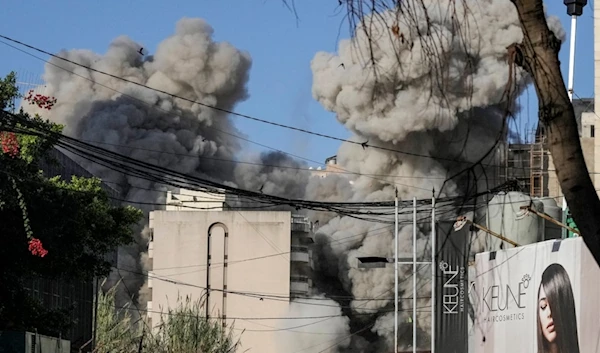 Smoke rises from a building collapsing after it was hit by an Israeli occupation airstrike in Chiyah, south of Beirut, Lebanon, Sunday, Nov. 17, 2024. (AP)