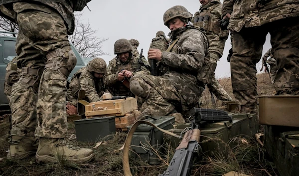 In this photo provided by Ukraine's 24th Mechanised Brigade press service, servicemen of the 24th Mechanised Brigade TRAIN their tactical skills at the training field in Donetsk region, Ukraine, Wednesday, Nov. 6, 2024. (AP)