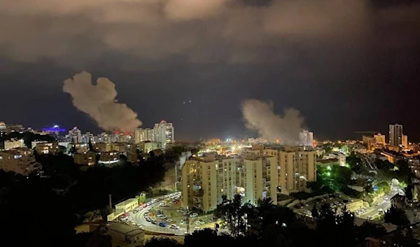 An image showing smoke rising after Hezbollah strikes hit occupied haifa in norther occupied Palestine on October 7, 2024. (Social media)