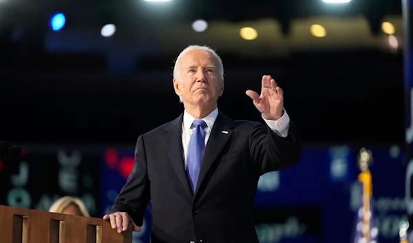 US President Joe Biden waves during the Democratic National Convention on Monday August 19,2024, in Chicago. (AP)