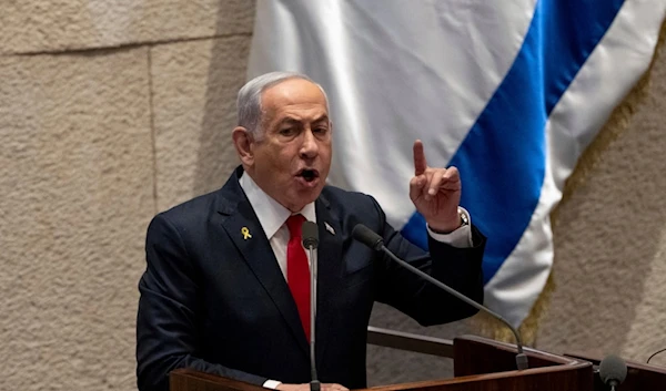 Israeli occupation Prime Minister Benjamin Netanyahu addresses lawmakers in the Israeli occupation Knesset, in occupied al-Quds,occupied Palestine, Nov.18, 2024. (AP)