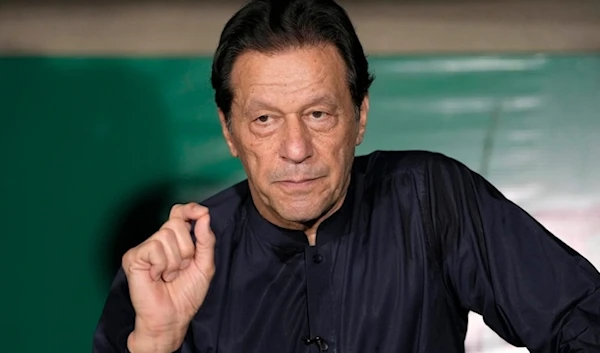 Pakistan's former Prime Minister Imran Khan gives a press conference at his home, in Lahore, Pakistan, on May 18, 2023. (AP)