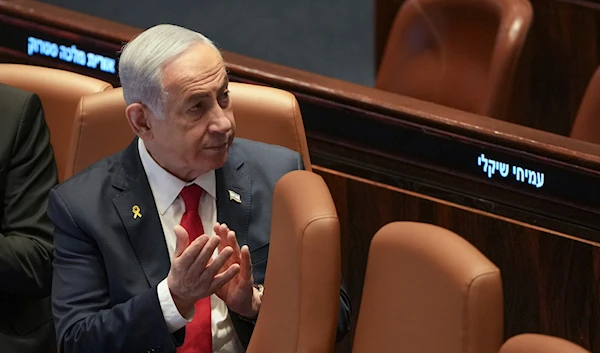 Israel's Prime Minister Benjamin Netanyahu attends a session of the Knesset in occupied al-Quds, on November18, 2024.(AP)