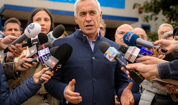 Calin Georgescu, running as an independent candidate for president, speaks to media after registering his bid in the country's presidential elections, in Bucharest, Romania, on October 1, 2024. (AP)