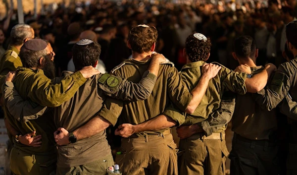 Israeli occupation soldiers mourn during a funeral of reservist at Mevo Horon settlement, occupied West Bank, occupied Palestine, Oct. 30, 2024. (AP)