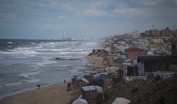 Tents occupied by displaced Palestinians are seen at the beach in Deir al-Balah, Gaza Strip, Tuesday, November 26, 2024 (AP)