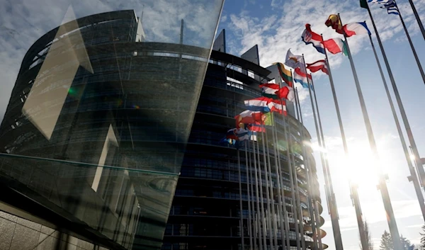 Flags of European Union member countries flap in the wind outside the European Parliament in Strasbourg, France, Wednesday, Nov. 27, 2024. (AP)