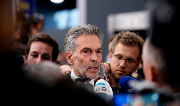 Netherland's Prime Minister Dick Schoof, center, speaks with journalists during an EU Summit at the Puskas Arena in Budapest, Hungary, Friday, Nov. 8, 2024. (AP)