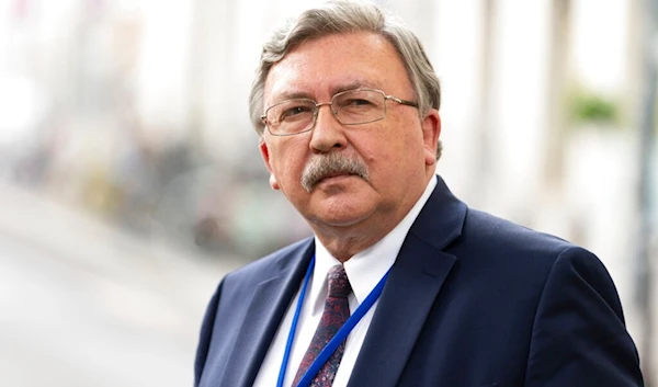 Russia's Governor to the International Atomic Energy Agency (IAEA), Mikhail Ulyanov, addresses the media near the 'Grand Hotel Vienna' where where closed-door nuclear talks take place in Vienna, Austria, Saturday, June 12, 2021. (AP)