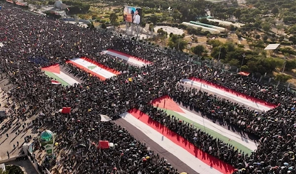 The flags of Yemen, Palestine, and Lebanon are shown amid a million-man demonstration in Sanaa on November 15, 2024 (Saba News Agency)