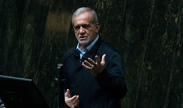 Iranian President Masoud Pezeshkian speaks in an open session of parliament to debate on his next year's budget bill, in Tehran, Iran, on October 29, 2024. (AP)