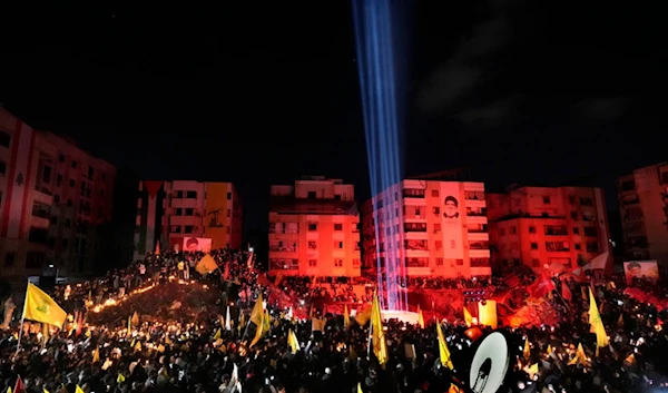 People gather at the site where former Hezbollah leader Sayyed Hassan Nasrallah was killed by Israeli airstrikes late September during a memorial ceremony in the southern suburb of Beirut, Lebanon, Saturday, November 30, 2024  (AP)