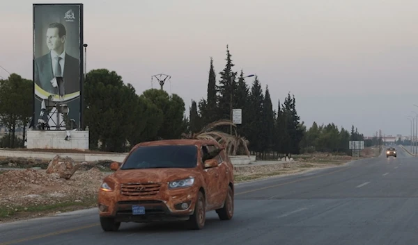 A car transits through Aleppo, Syria, Friday, Nov. 29, 2024. (AP Photo/Ghaith Alsayed)