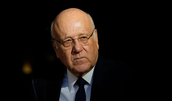 Lebanese caretaker Prime Minister Najib Mikati, looks on as he waits for the arrival of Italian Premier Giorgia Meloni, in Beirut, Lebanon, on October 18, 2024. (AP)