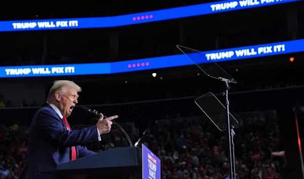 Republican presidential nominee former President Donald Trump speaks at a campaign rally at PPG Paints Arena, Monday, November 4, 2024, in Pittsburgh, Pennsylvania (AP)