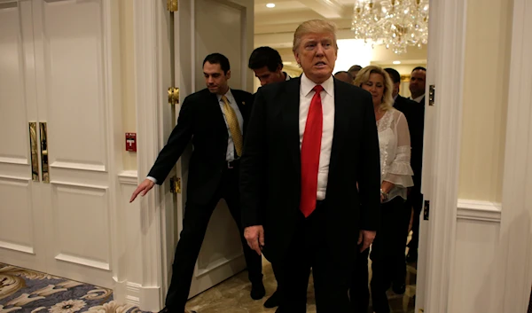 Republican presidential candidate Donald Trump arrives for a news conference at the Trump National Golf Club, on March 8, 2016, in Jupiter, Fla. (AP)