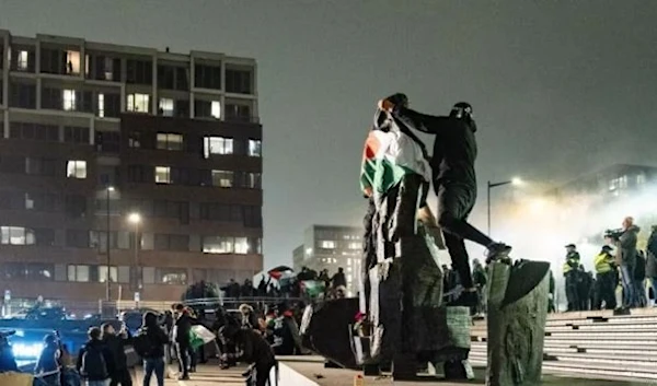 Pro-Palestinians demonstrate at Amsterdam's Anton de Komplein square ahead of the UEFA Europa League football match between Ajax and Maccabi Tel Aviv on November 7, 2024 in the aftermath of provocations by Israelis. ( AFP)