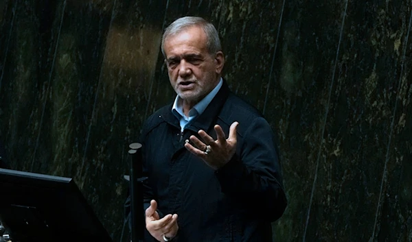 Iranian President Masoud Pezeshkian speaks in an open session of parliament to debate his next year's budget bill, in Tehran, Iran, Tuesday, October 29, 2024 (AP)