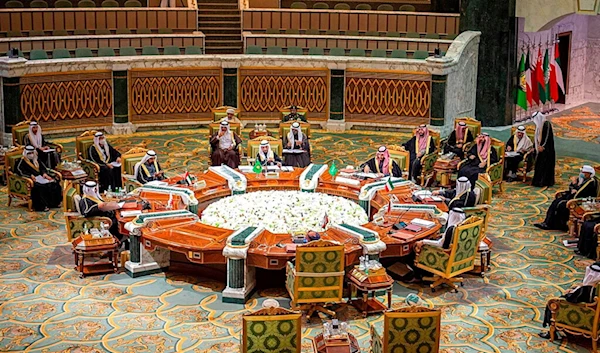 In this photo released by Saudi Royal Palace, Arab leaders of the Gulf Cooperation Council (GCC) attend their summit in Riyadh, Saudi Arabia, Tuesday, Dec. 14, 2021. (Bandar Aljaloud/Saudi Royal Palace via AP)