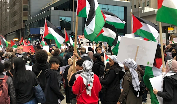 Thousands of protesters march down Chicago’s Michigan Avenue on October 21, 2023 in support of the Palestinians. (AP)