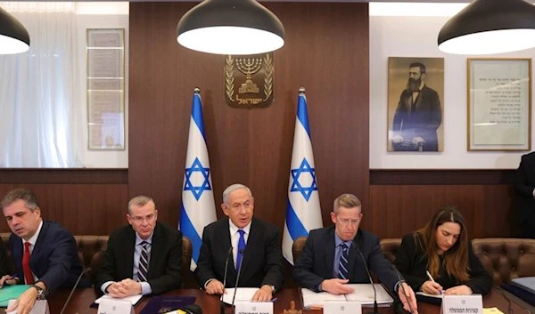 Israeli Prime Minister Benjamin Netanyahu attends the weekly cabinet meeting in the prime minister's office in al-Quds, February 19, 2023 (AP)