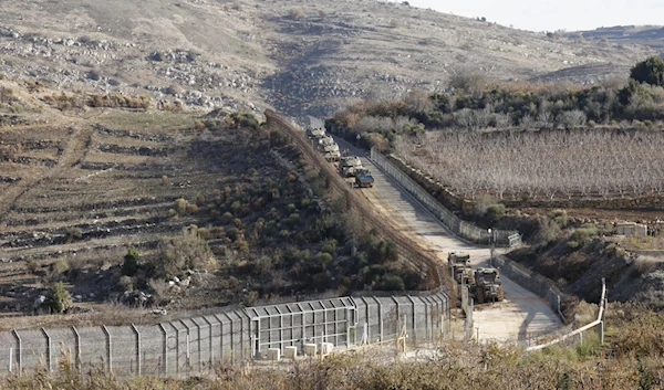 Israeli tanks take position on the border with Syria near the Druze village of Majdal Shams in the occupied Golan Heights on December 8, 2024. (AFP via Getty Images)