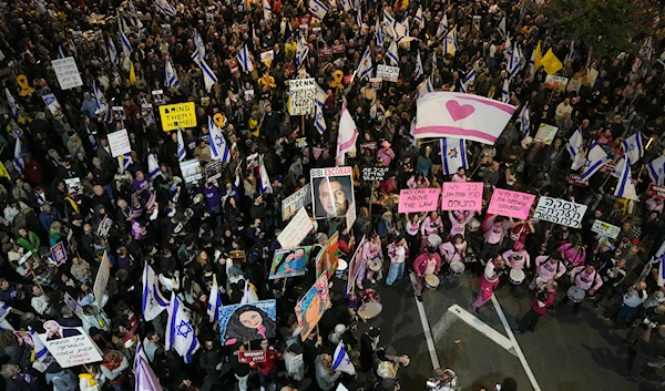 Israelis protest against Prime Minister Benjamin Netanyahu's government and call for the release of hostages held in the Gaza Strip by the Hamas militant group, in Tel Aviv, "Israel", on December 14, 2024. (AP)