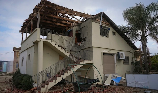 A damaged house is seen in the agricultural settlement of Avivim, in upper al-Jalil, "Israel", Thursday Nov 28, 2024. (AP)