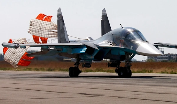 In this photo taken from Russian Defense Ministry official website on Tuesday, Oct. 6, 2015, a Russian SU-34 bomber lands at an airbase Hmeimim in Syria. (AP)